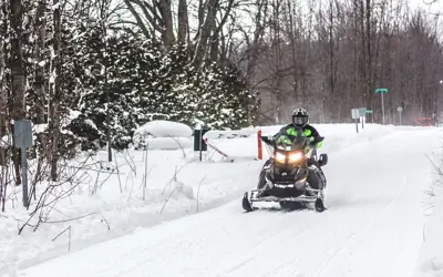 Snowmobile on trail